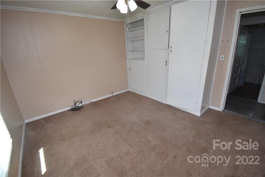 210 Proctor Street Lincolnton, NC 28092 - Photo 14 of 19 a view of an empty room