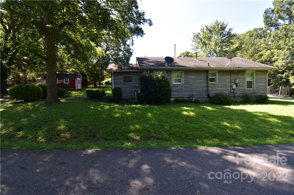 210 Proctor Street Lincolnton, NC 28092 - Photo 17 of 19 a view of a backyard of the house