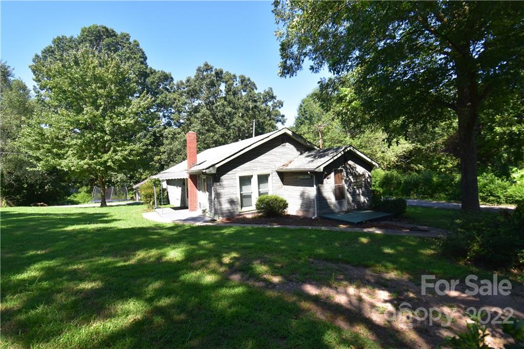 210 Proctor Street Lincolnton, NC 28092 - Photo 2 of 19 a house view with a outdoor space