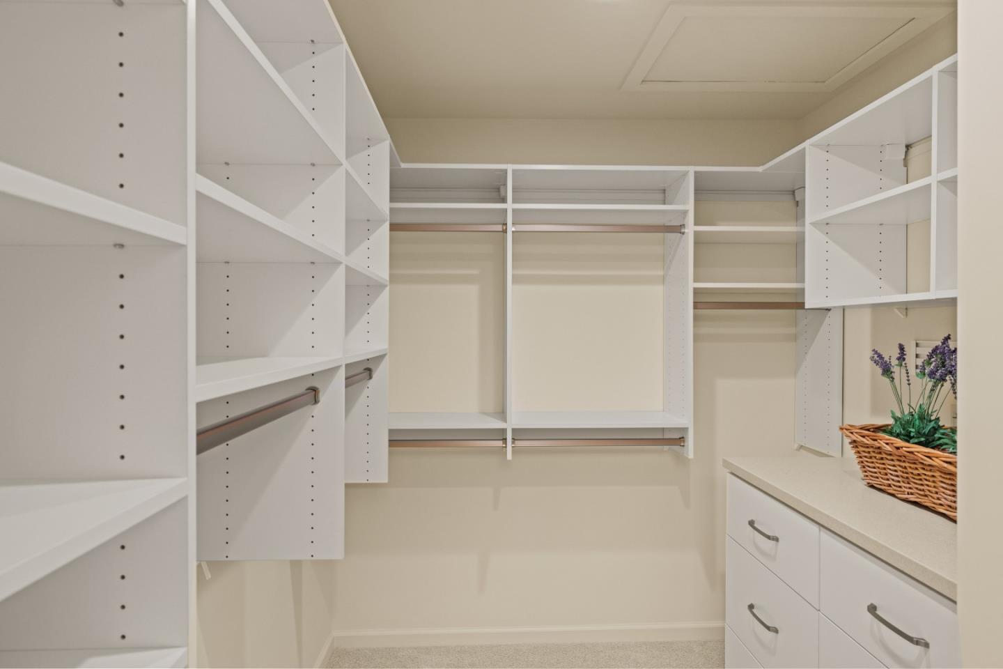 3850 Rio Road, Unit 61 Carmel, CA 93923 - Photo 22 of 46 a view of walk in closet with empty racks