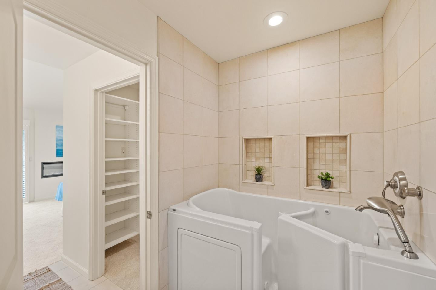 3850 Rio Road, Unit 61 Carmel, CA 93923 - Photo 23 of 46 a bathroom with a sink and a bathtub