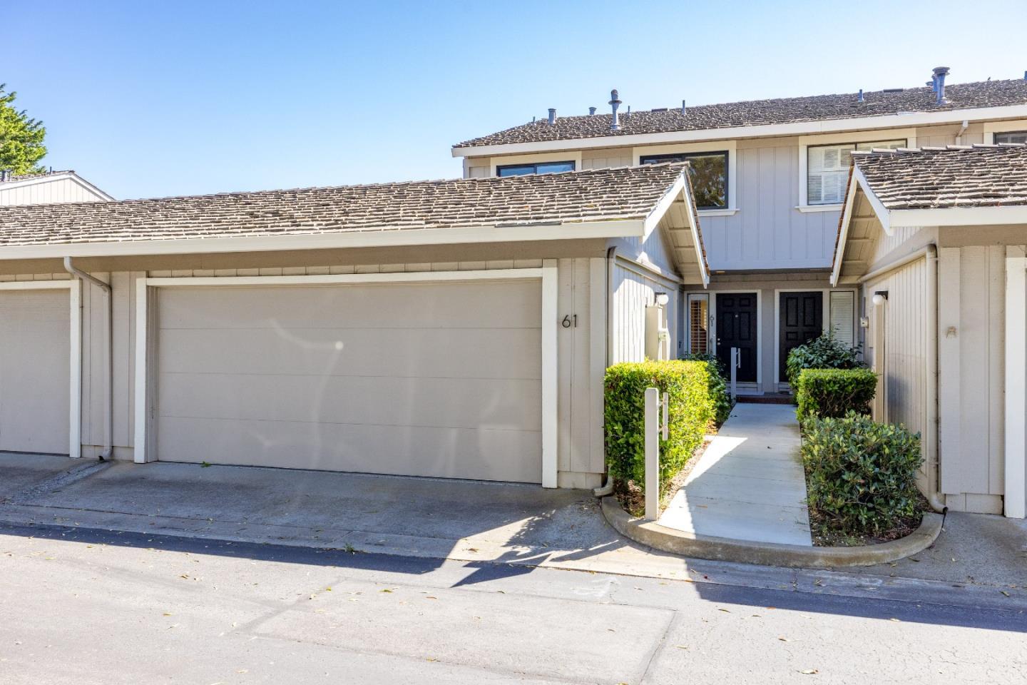 3850 Rio Road, Unit 61 Carmel, CA 93923 - Photo 39 of 46 a view of a house with potted plants