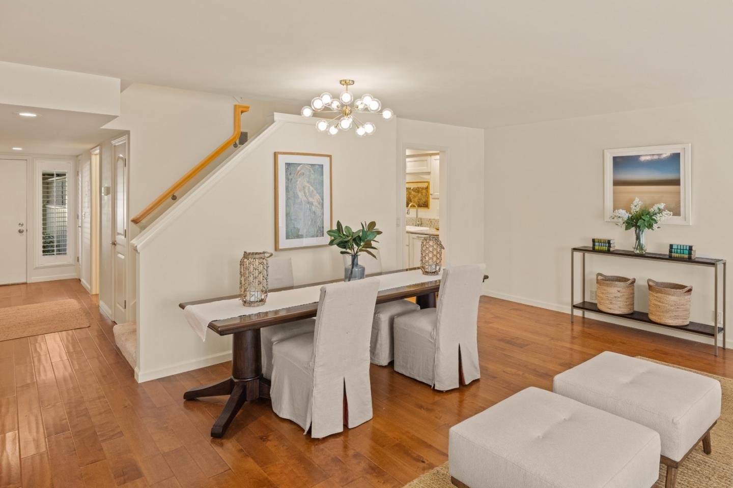 3850 Rio Road, Unit 61 Carmel, CA 93923 - Photo 6 of 46 a view of a dining room with furniture and wooden floor