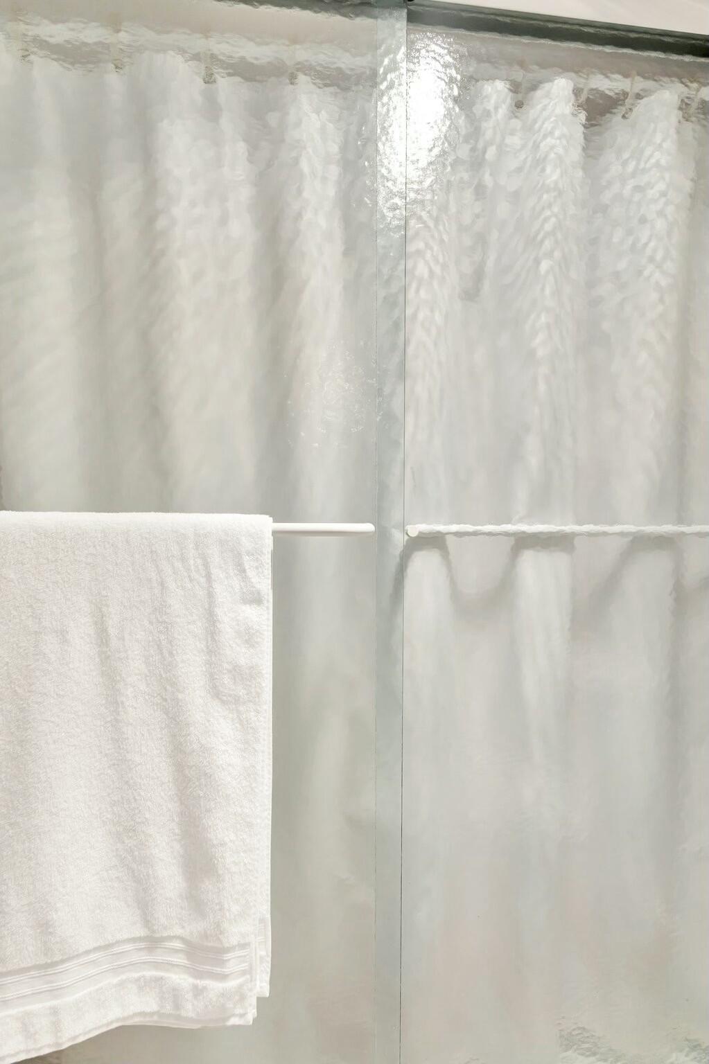 2320 Southwest 22nd Avenue, Unit 211 Delray Beach, FL 33445 - Photo 17 of 38 a close view of shower curtain