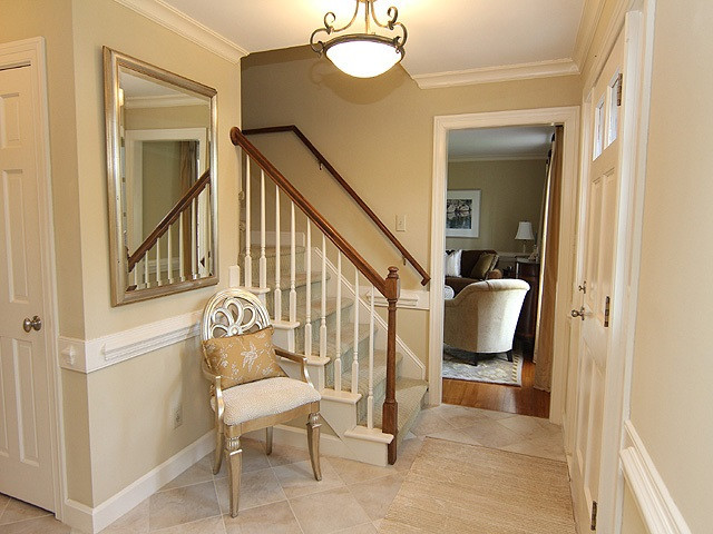 8013 Shellnut Road Raleigh, NC 27615 - Photo 3 of 25 Foyer and center hall have lovely tile floor, and there are smooth ceilings throughout the home. Entry