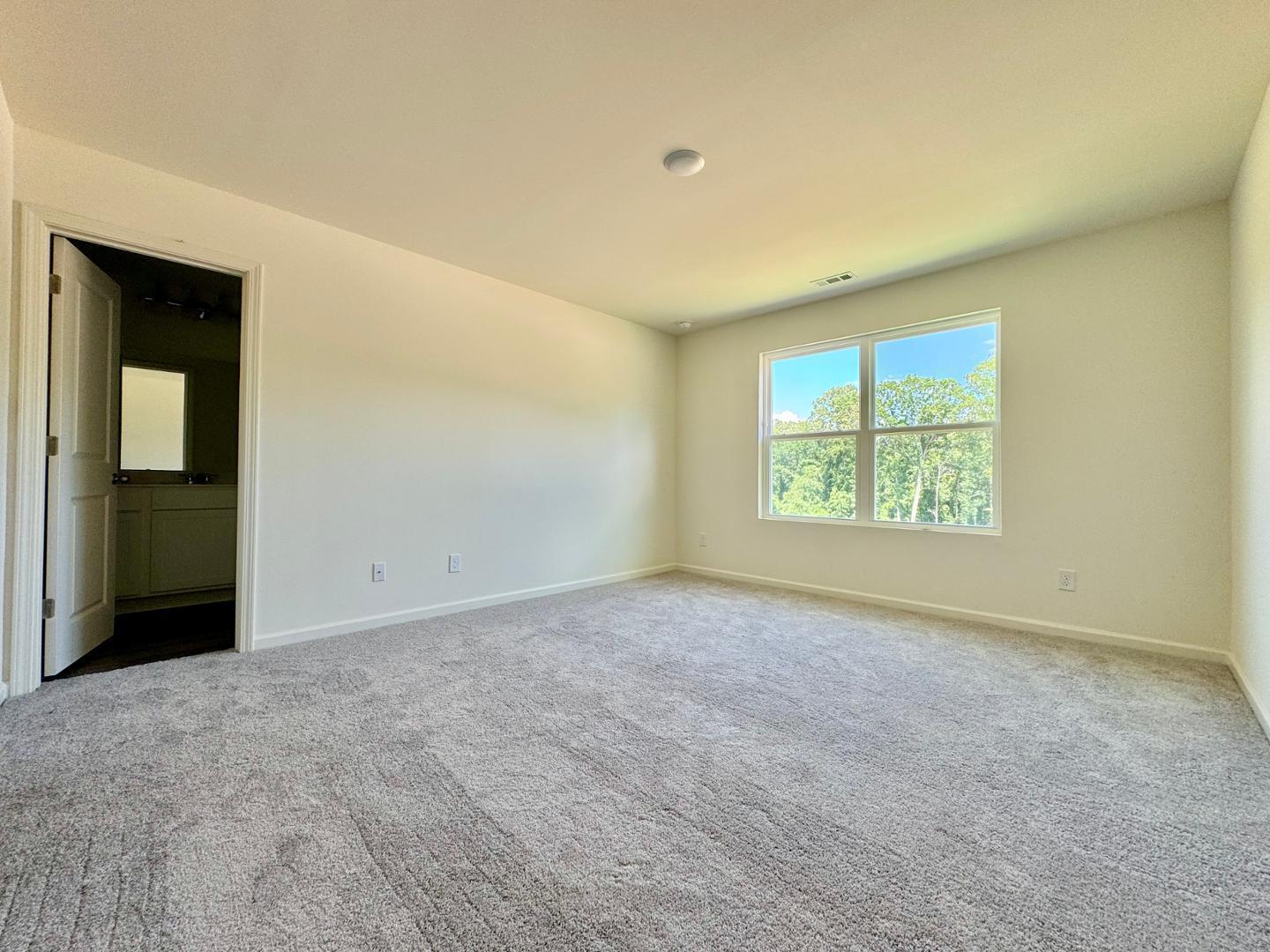3117 Primo Drive Durham, NC 27704 - Photo 11 of 23 an empty room with windows