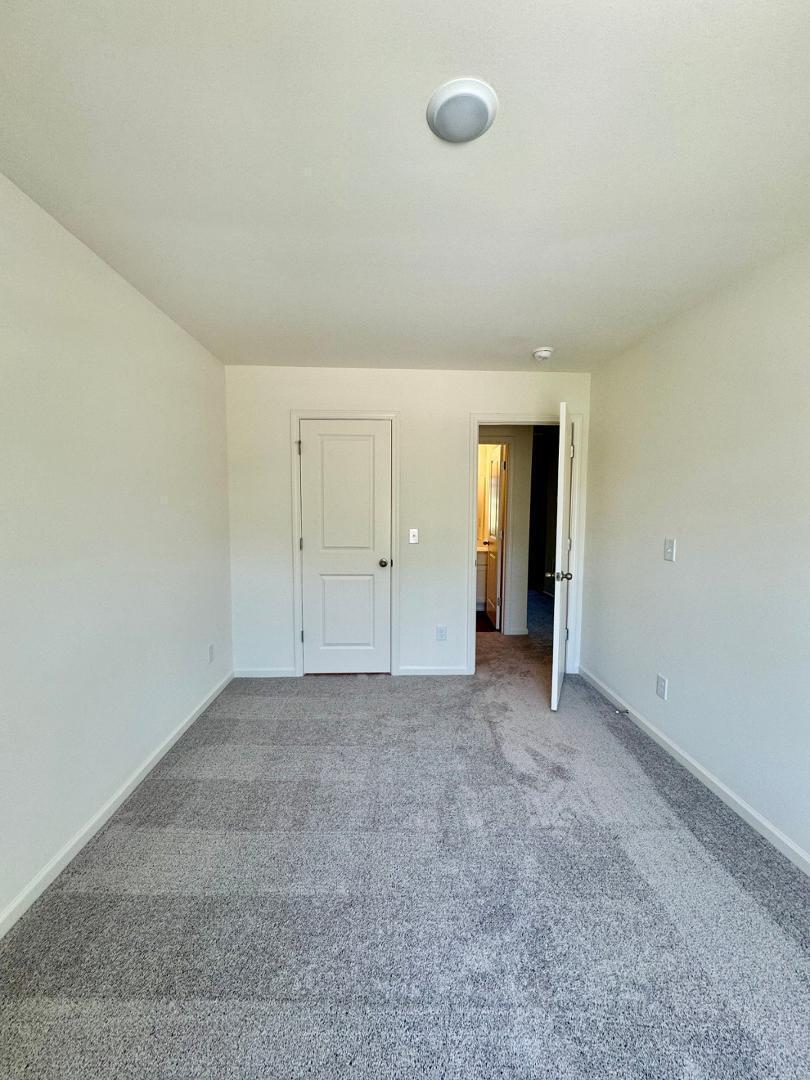 3117 Primo Drive Durham, NC 27704 - Photo 20 of 23 an empty room with closet area