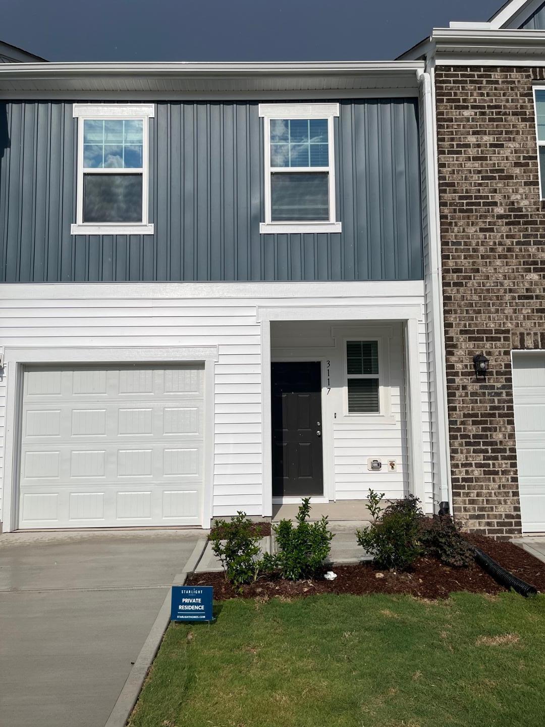 3117 Primo Drive Durham, NC 27704 - Photo 2 of 23 a house that has a large window in it