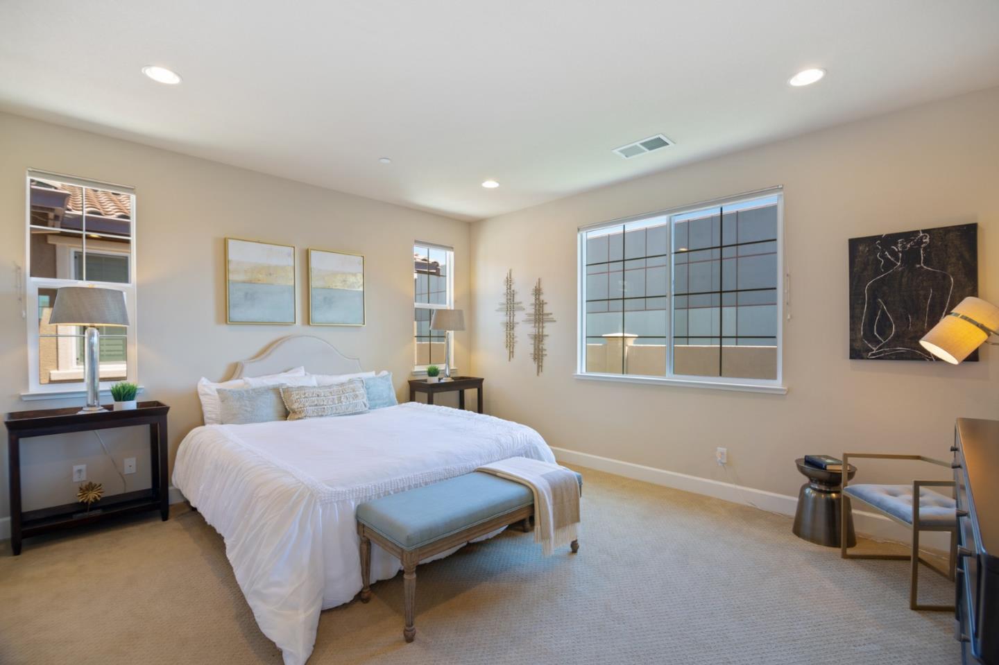 328 Gerald Circle Milpitas, CA 95035 - Photo 13 of 33 a bedroom with a bed a table and windows