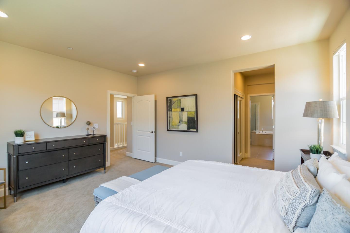 328 Gerald Circle Milpitas, CA 95035 - Photo 14 of 33 a bed room with a bed and a mirror