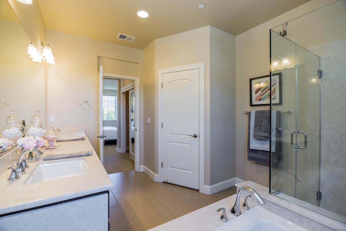 328 Gerald Circle Milpitas, CA 95035 - Photo 16 of 33 a bathroom with a sink a shower and a mirror