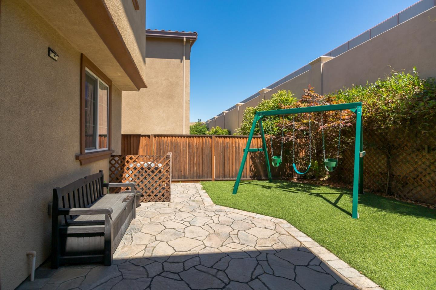 328 Gerald Circle Milpitas, CA 95035 - Photo 23 of 33 a view of a chair and table in the patio with potted plants