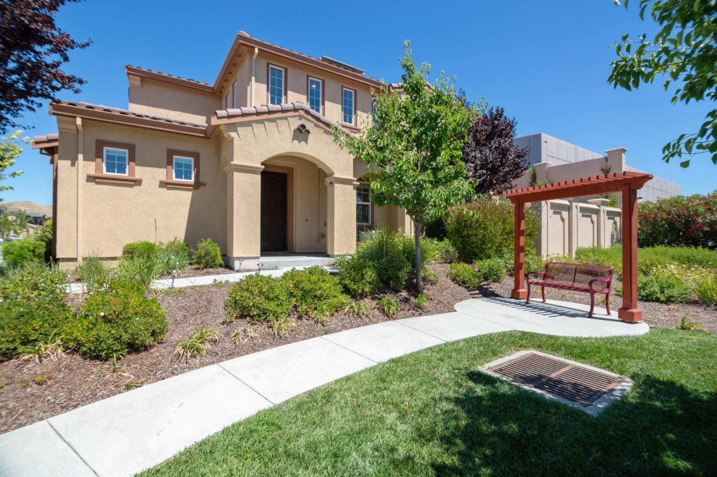 328 Gerald Circle Milpitas, CA 95035 - Photo 28 of 33 a front view of a house with a garden and plants