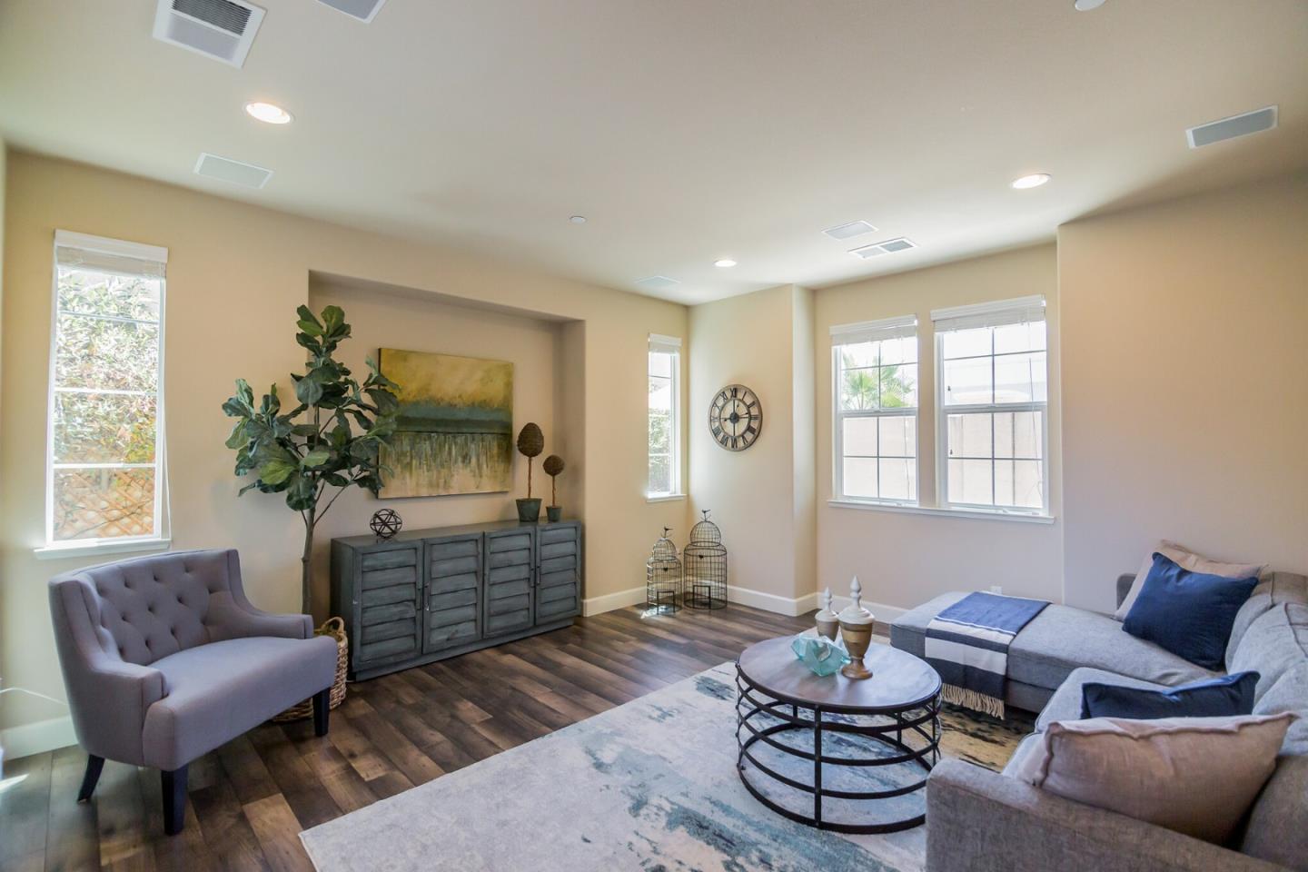 328 Gerald Circle Milpitas, CA 95035 - Photo 10 of 33 a living room with furniture and a potted plant
