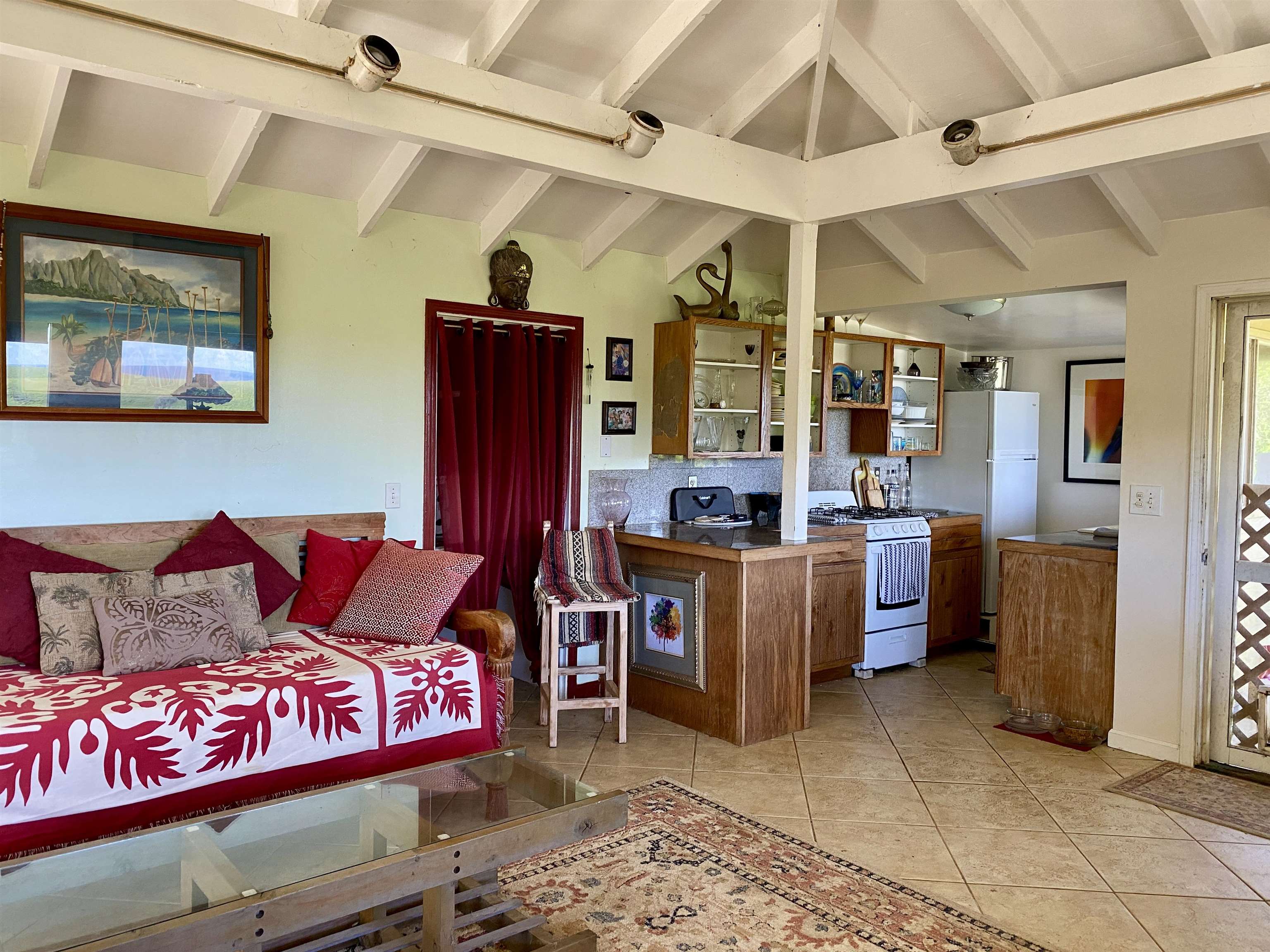 700 Honopou Road, Unit 700 HONOPOU RD Haiku, HI 96708 - Photo 18 of 50 a living room with furniture and kitchen view