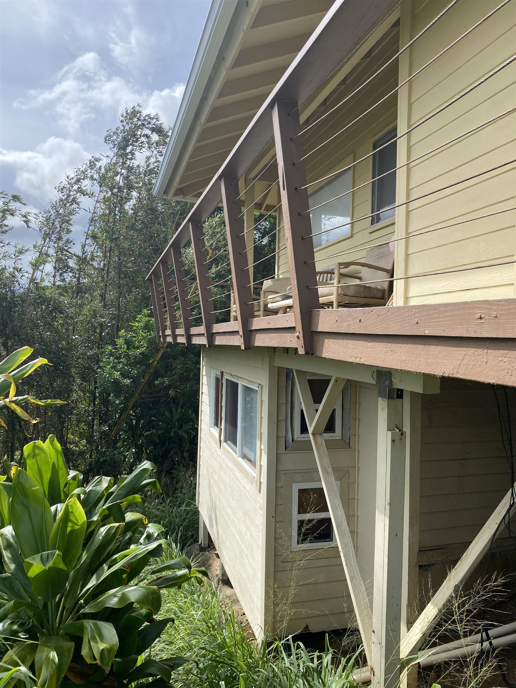 700 Honopou Road, Unit 700 HONOPOU RD Haiku, HI 96708 - Photo 19 of 50 a front view of a house with a yard