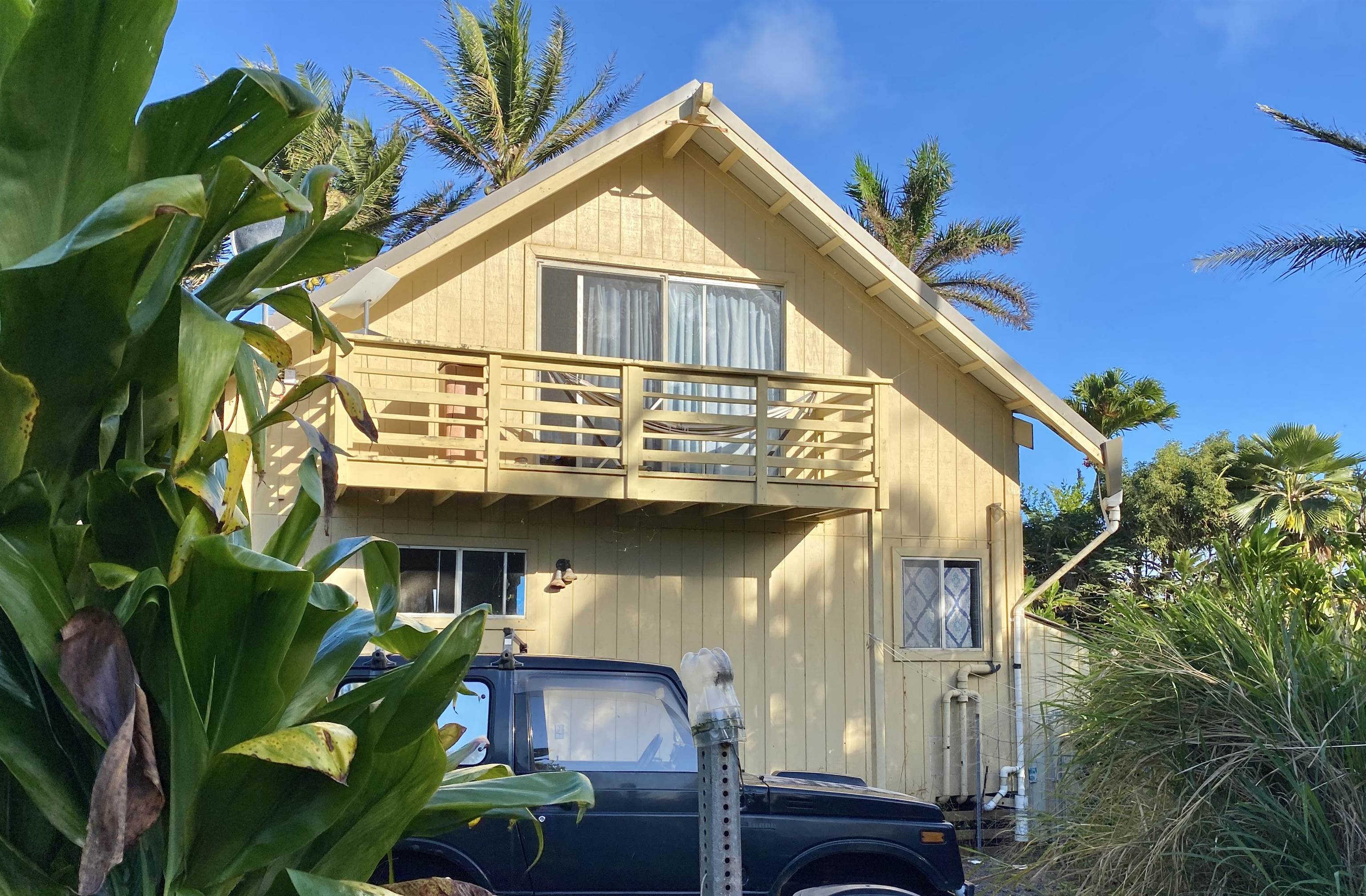 700 Honopou Road, Unit 700 HONOPOU RD Haiku, HI 96708 - Photo 5 of 50 a view of a house with a small yard