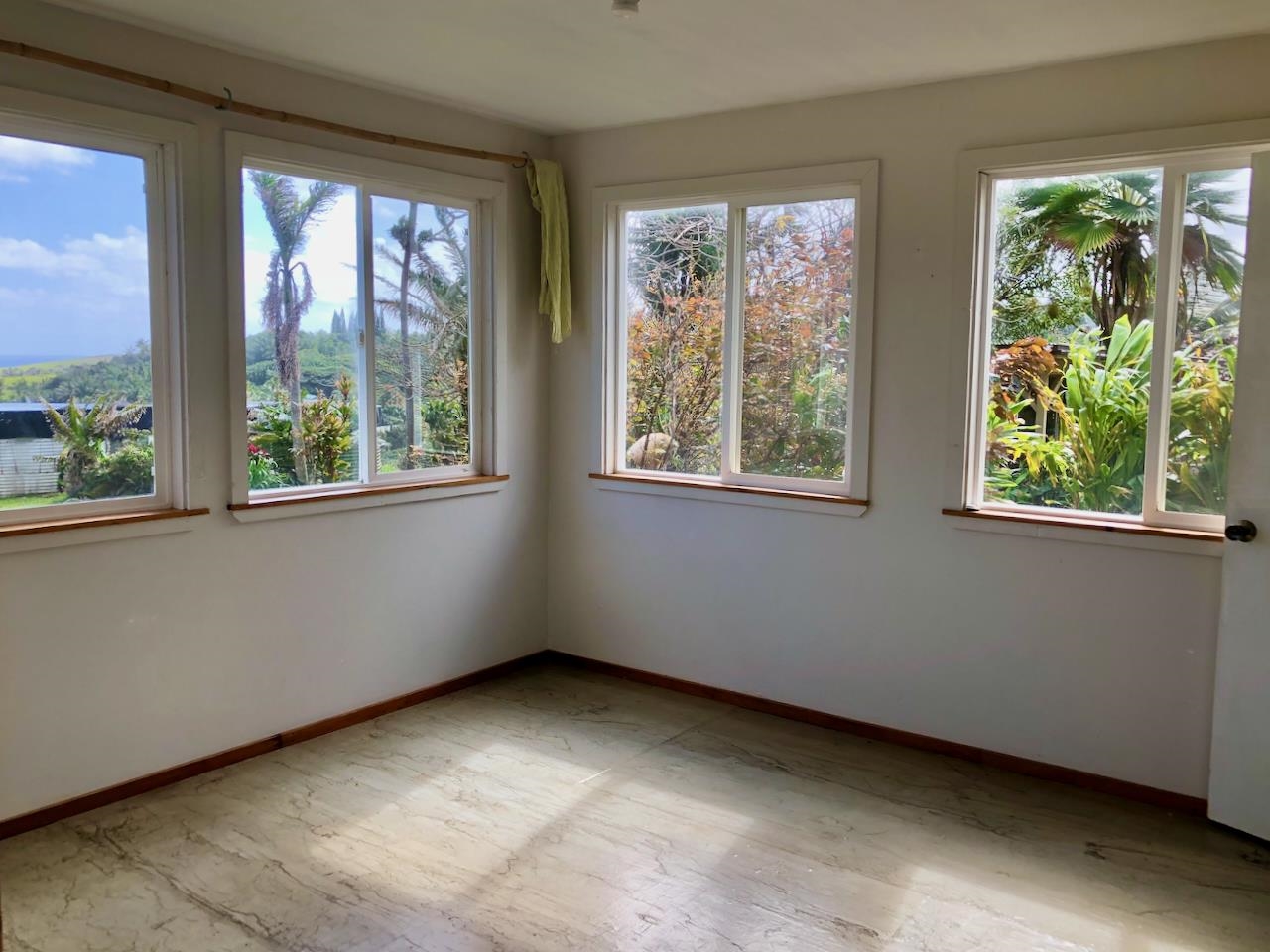 700 Honopou Road, Unit 700 HONOPOU RD Haiku, HI 96708 - Photo 8 of 50 a view of an empty room with windows