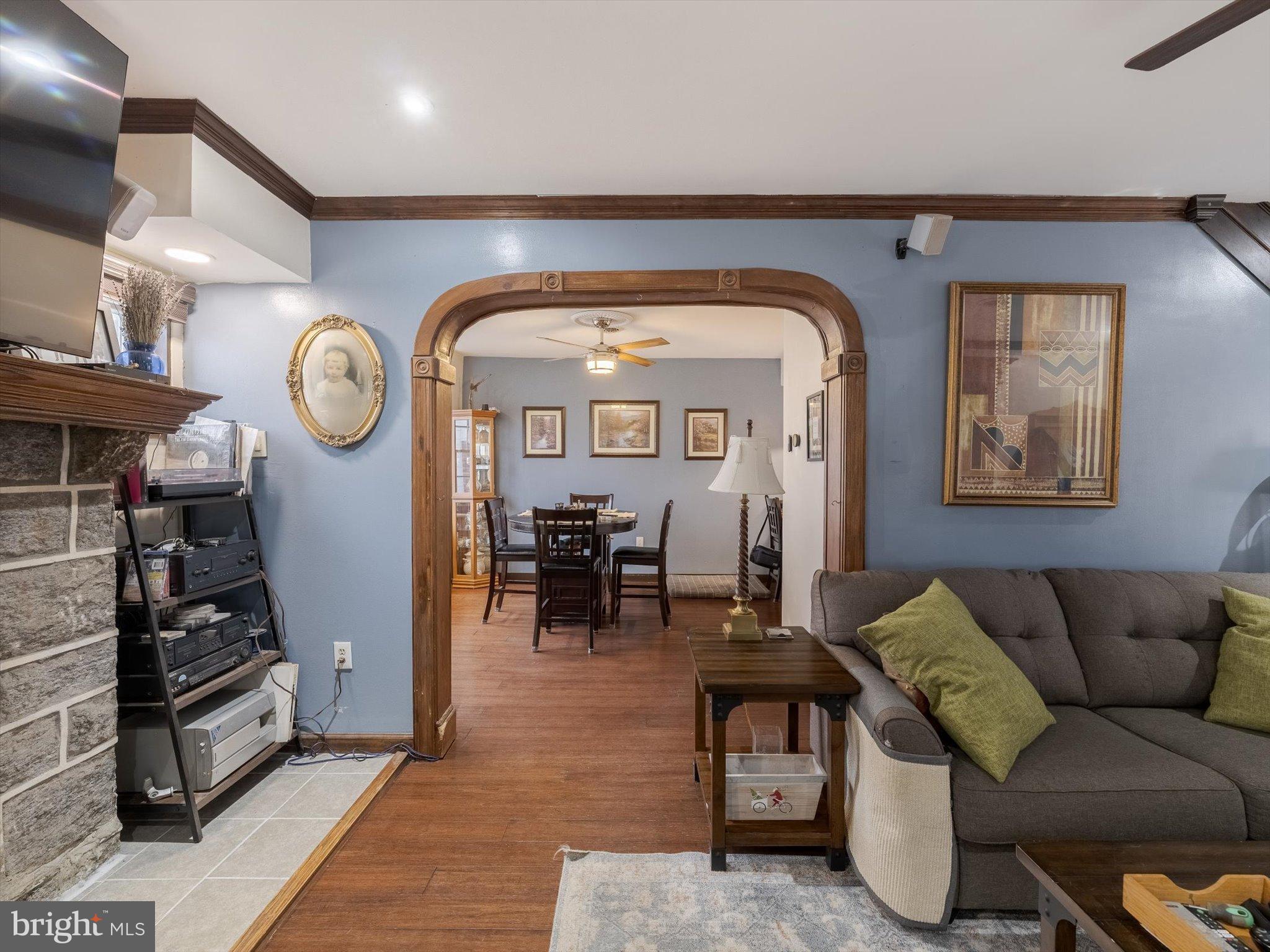 908 West Amosland Road Prospect Park, PA 19076 - Photo 16 of 35 a living room with furniture and a clock