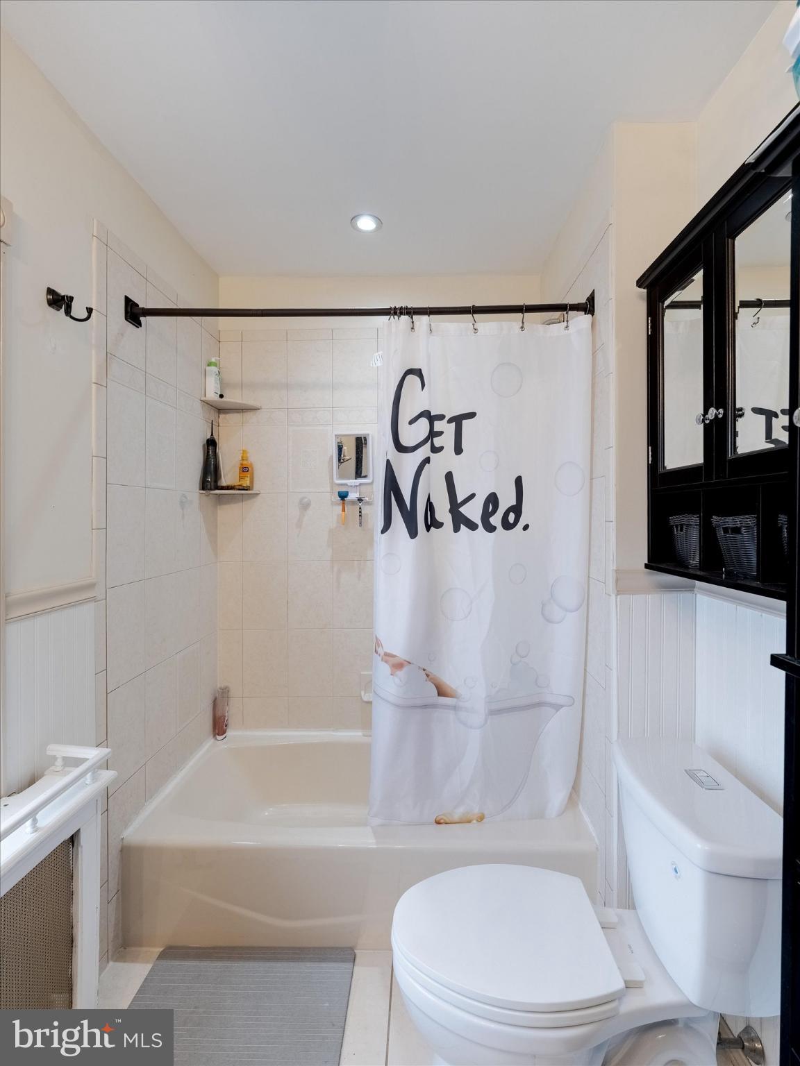 908 West Amosland Road Prospect Park, PA 19076 - Photo 23 of 35 a white toilet sitting next to a bath tub