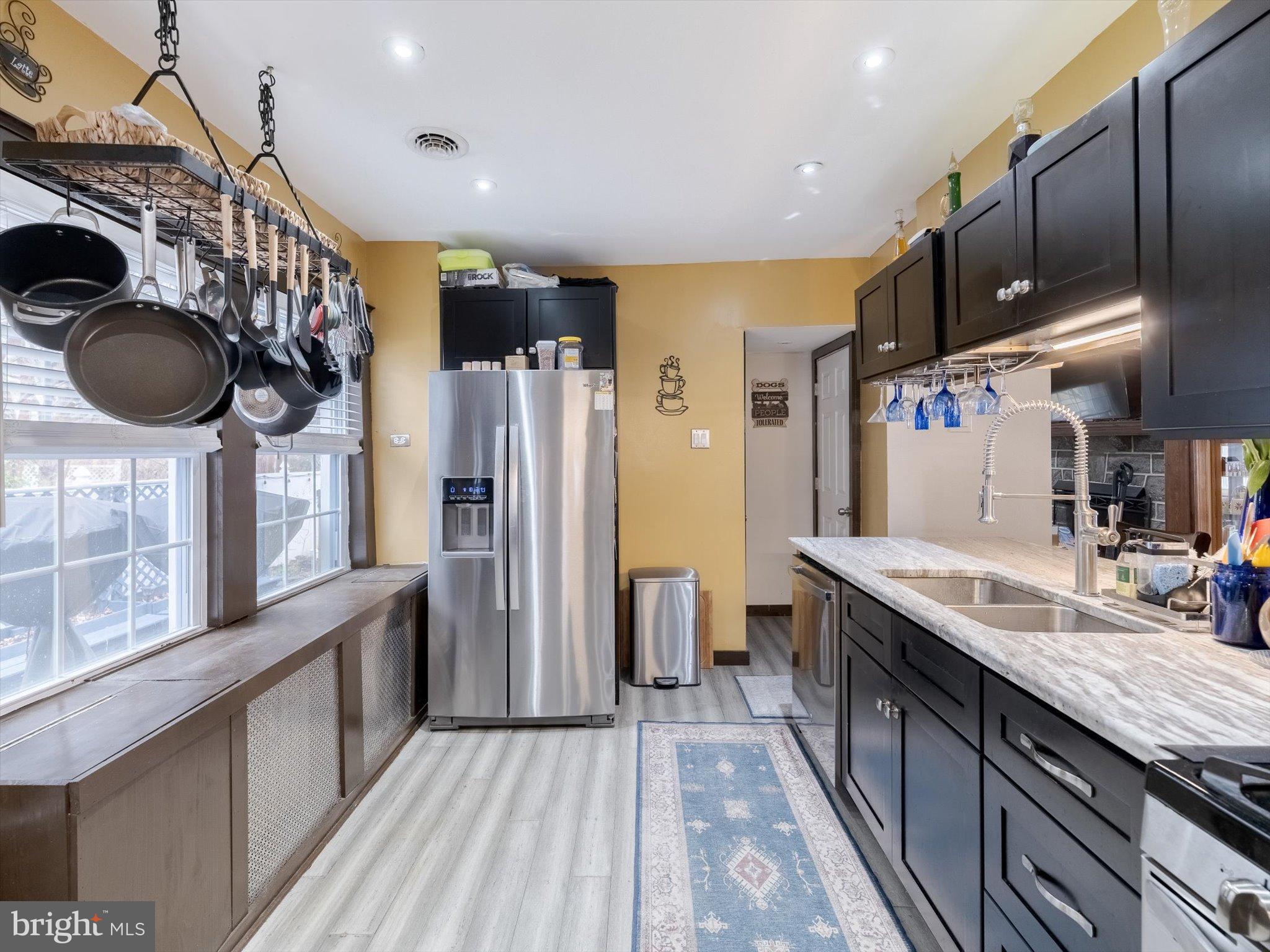 908 West Amosland Road Prospect Park, PA 19076 - Photo 5 of 35 Updated kitchen with gas cooking and stone counter