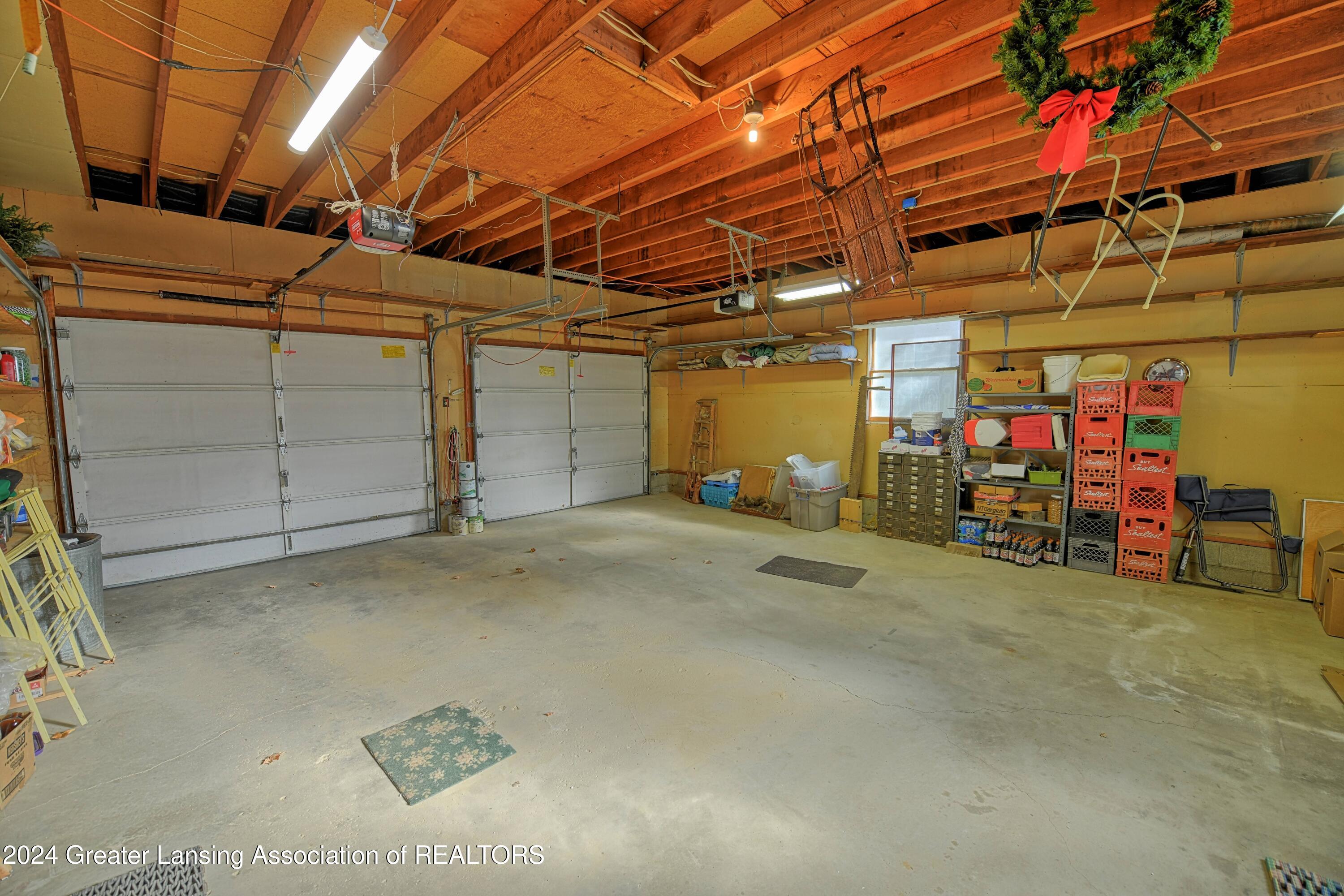 15027 West Cutler Road Portland, MI 48875 - Photo 34 of 65 2 car attached garage