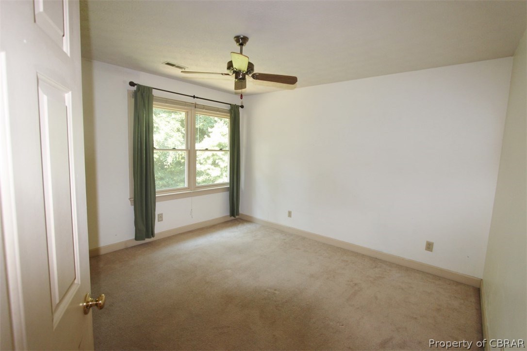 308 Tides Run Yorktown, VA 23692 - Photo 17 of 34 a view of an empty room with a window