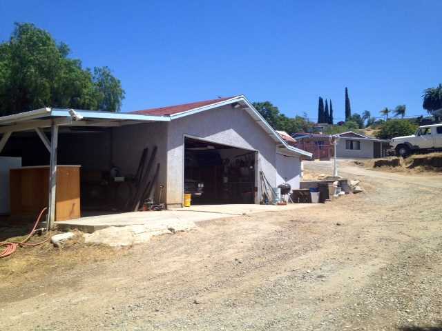 12236 Rockcrest Road Lakeside, CA 92040 - Photo 3 of 8 View of drive thru garage (43x24) workshop (43x9) and covered carport (30x12)