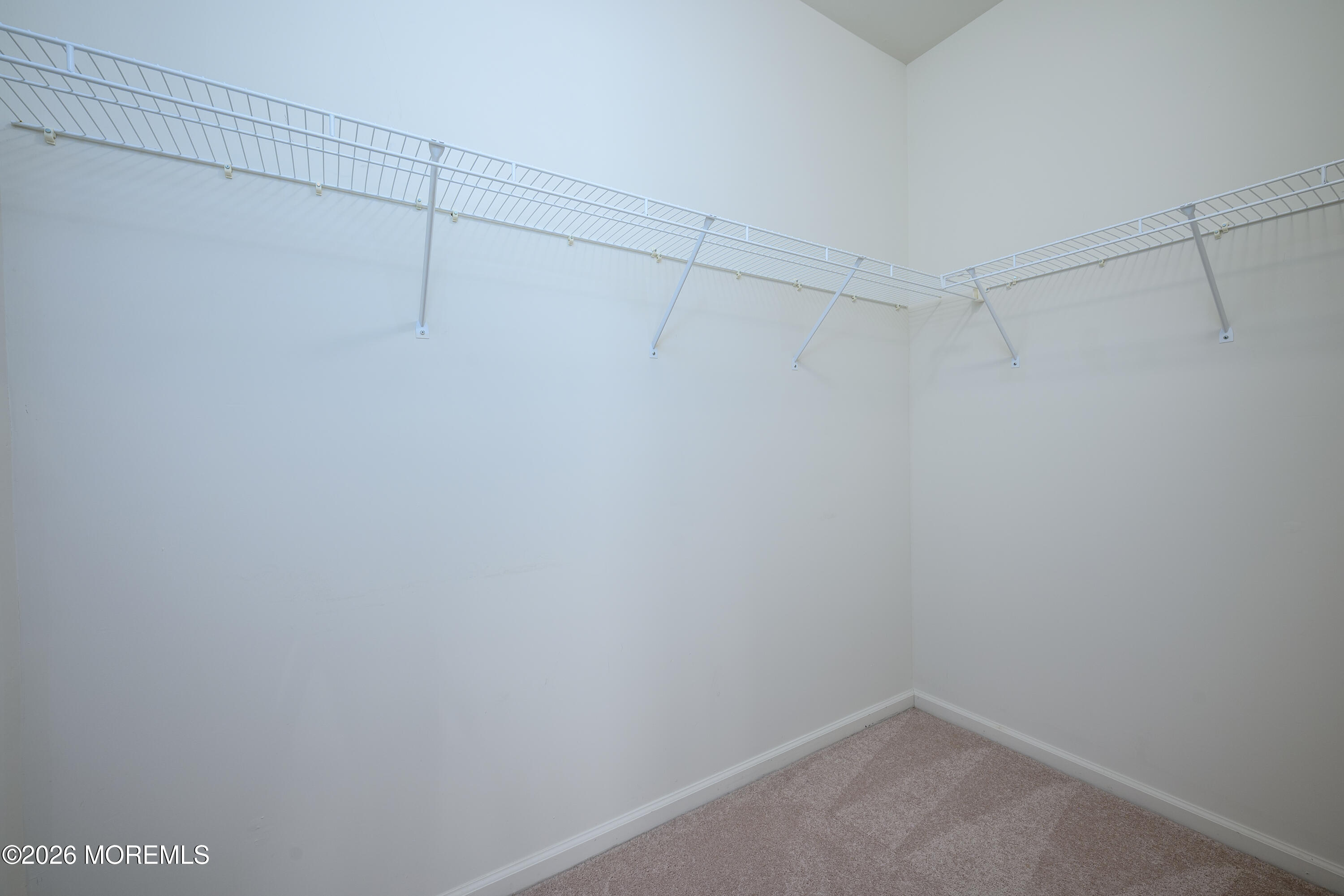 33 Cromwell Lane Jackson, NJ 08527 - Photo 20 of 32 a view of a room with racks on the wall