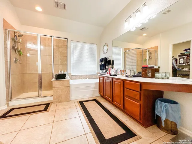 a large kitchen with kitchen island granite countertop a large counter top space and living room