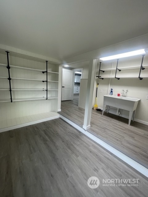 1244 Cedar Street Raymond, WA 98577 - Photo 14 of 25 a view of a room with wooden floor and window