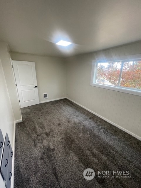 1244 Cedar Street Raymond, WA 98577 - Photo 21 of 25 a view of empty room with window