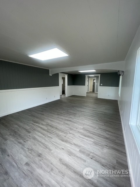1244 Cedar Street Raymond, WA 98577 - Photo 6 of 25 a view of a livingroom with wooden floor