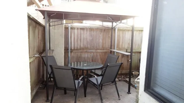 a car parked in front of garage