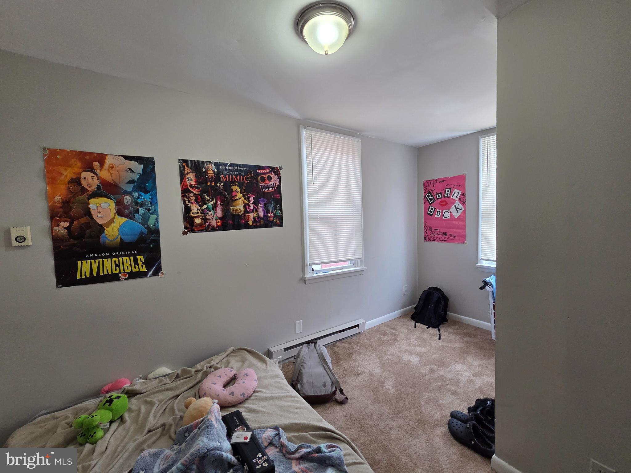 223 Summer Street Hagerstown, MD 21740 - Photo 4 of 15 a bedroom with a bed and painting on the wall