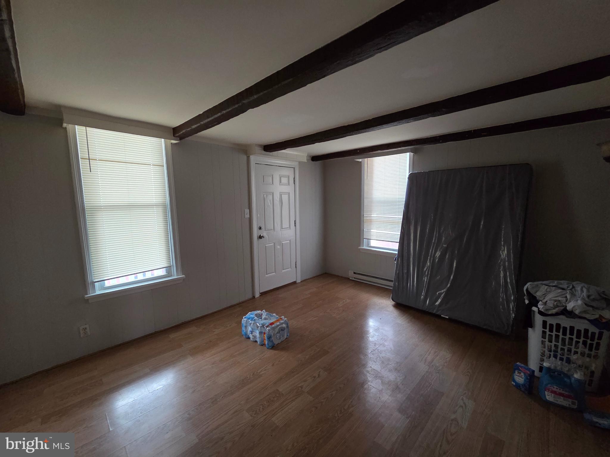 223 Summer Street Hagerstown, MD 21740 - Photo 10 of 15 a view of wooden floor and windows in a room