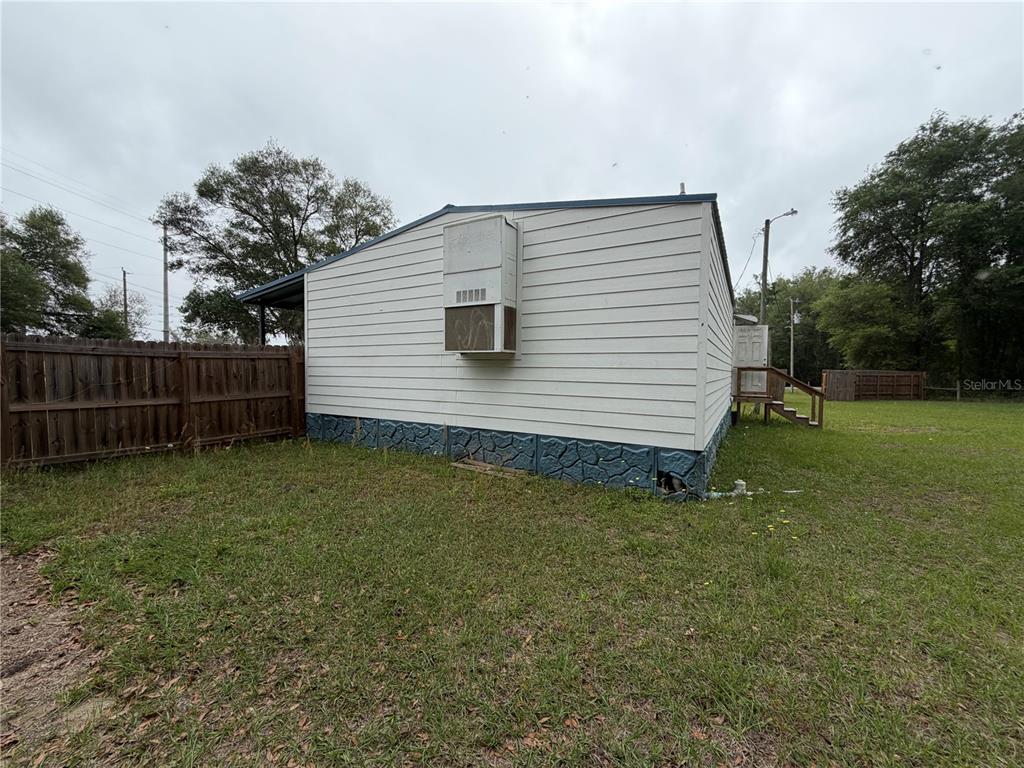 683 North Court Street Bronson, FL 32621 - Photo 23 of 33 a view of a backyard