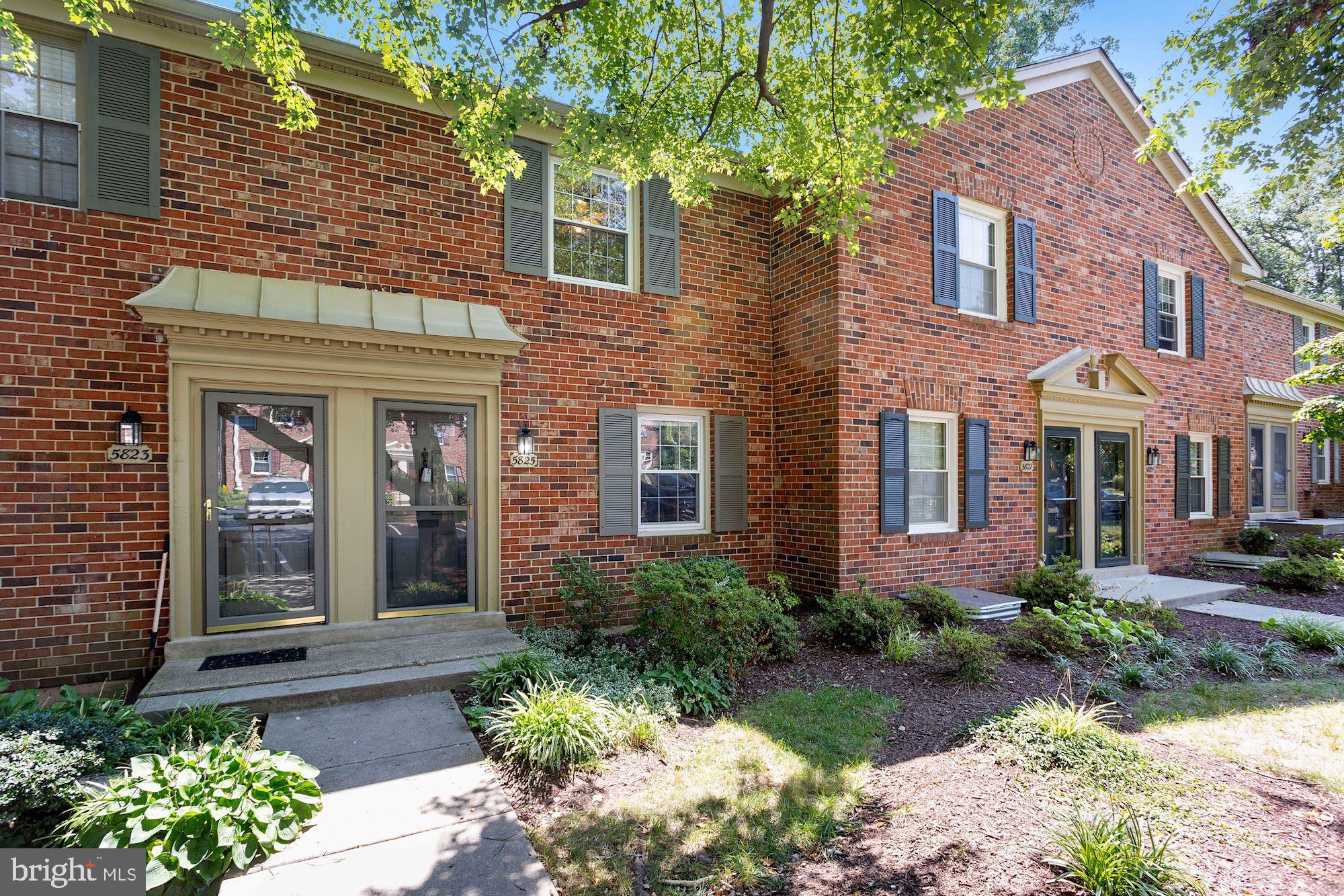 5825 Rexford Drive, Unit 711 Springfield, VA 22152 - Photo 2 of 45 Brick front & surrounded by mature trees