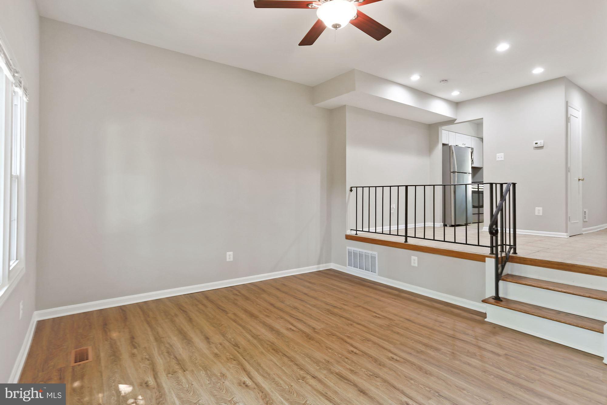 5825 Rexford Drive, Unit 711 Springfield, VA 22152 - Photo 10 of 45 Step Down Living Room w/12ft ceilings