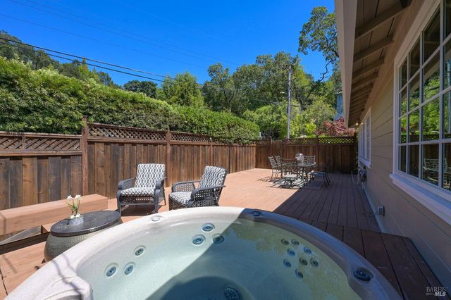 a view of a patio in the backyard