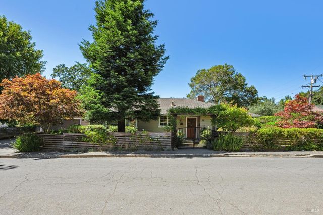 front view of a house with a street