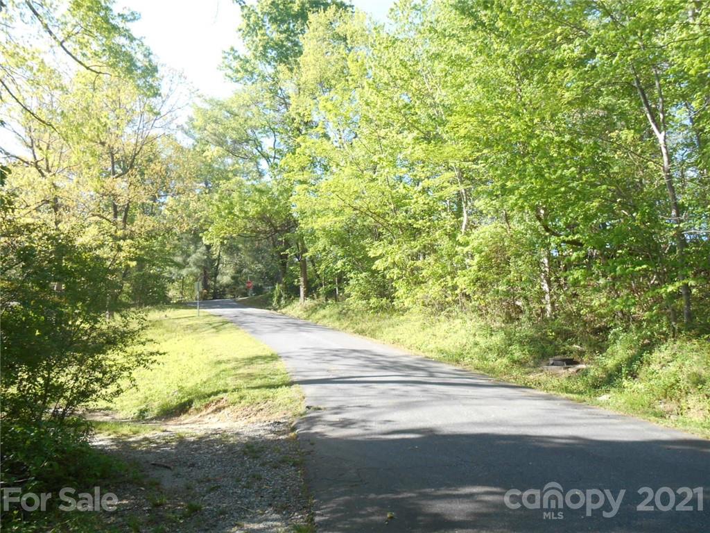 0 Shepherd Street Tryon, NC 28782 - Photo 4 of 9 a view of a yard with wooden fence