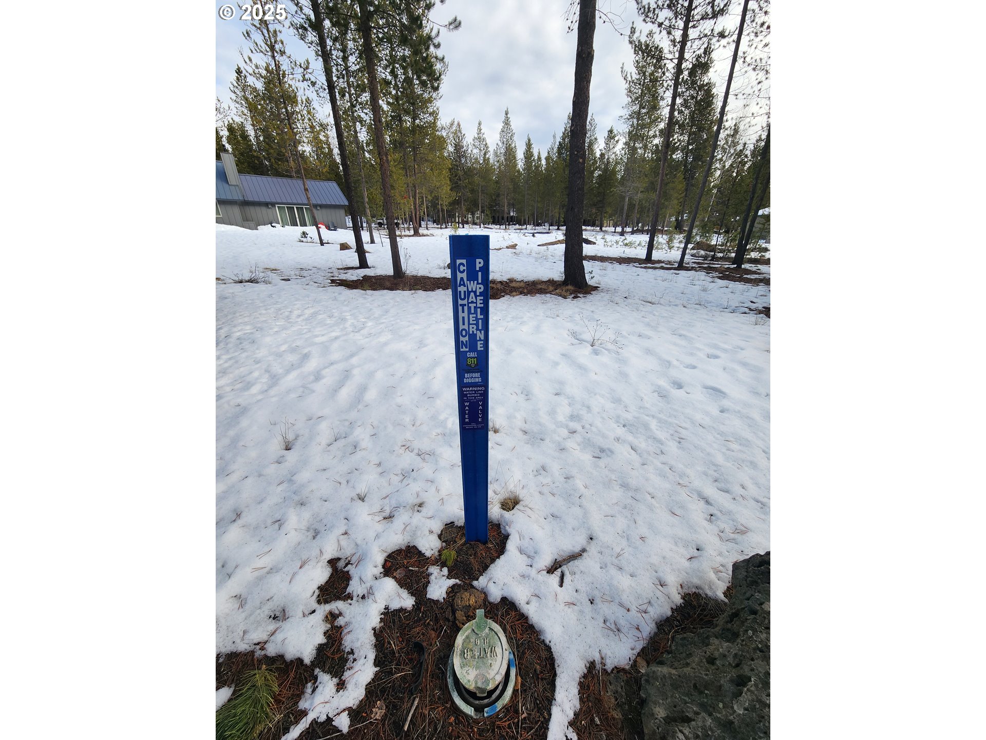 57626 Cultus Lane Sunriver, OR 97707 - Photo 2 of 10 a view of a backyard with large trees