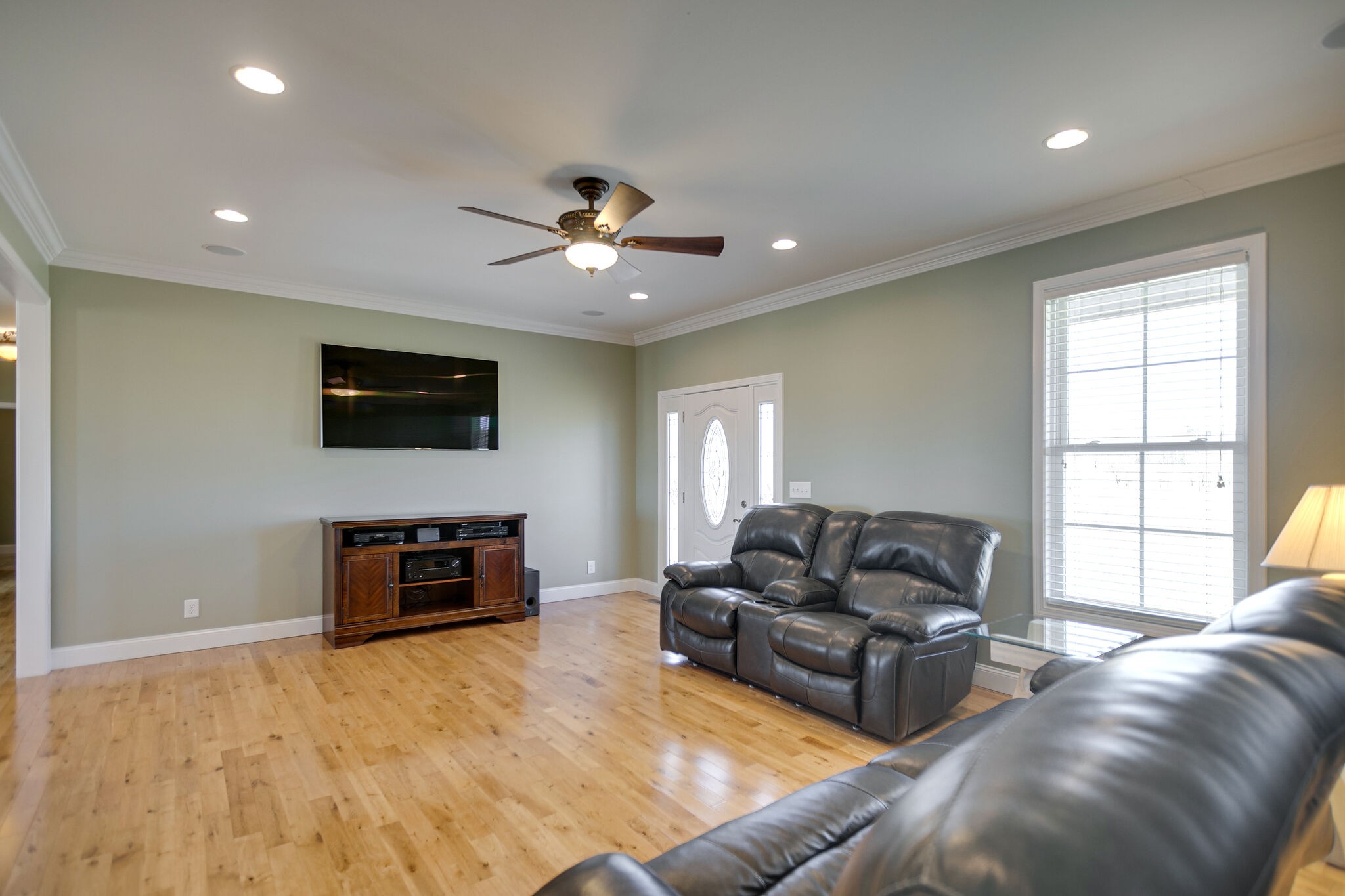 58 Locker Road Summertown, TN 38483 - Photo 11 of 28 a living room with furniture and a flat screen tv