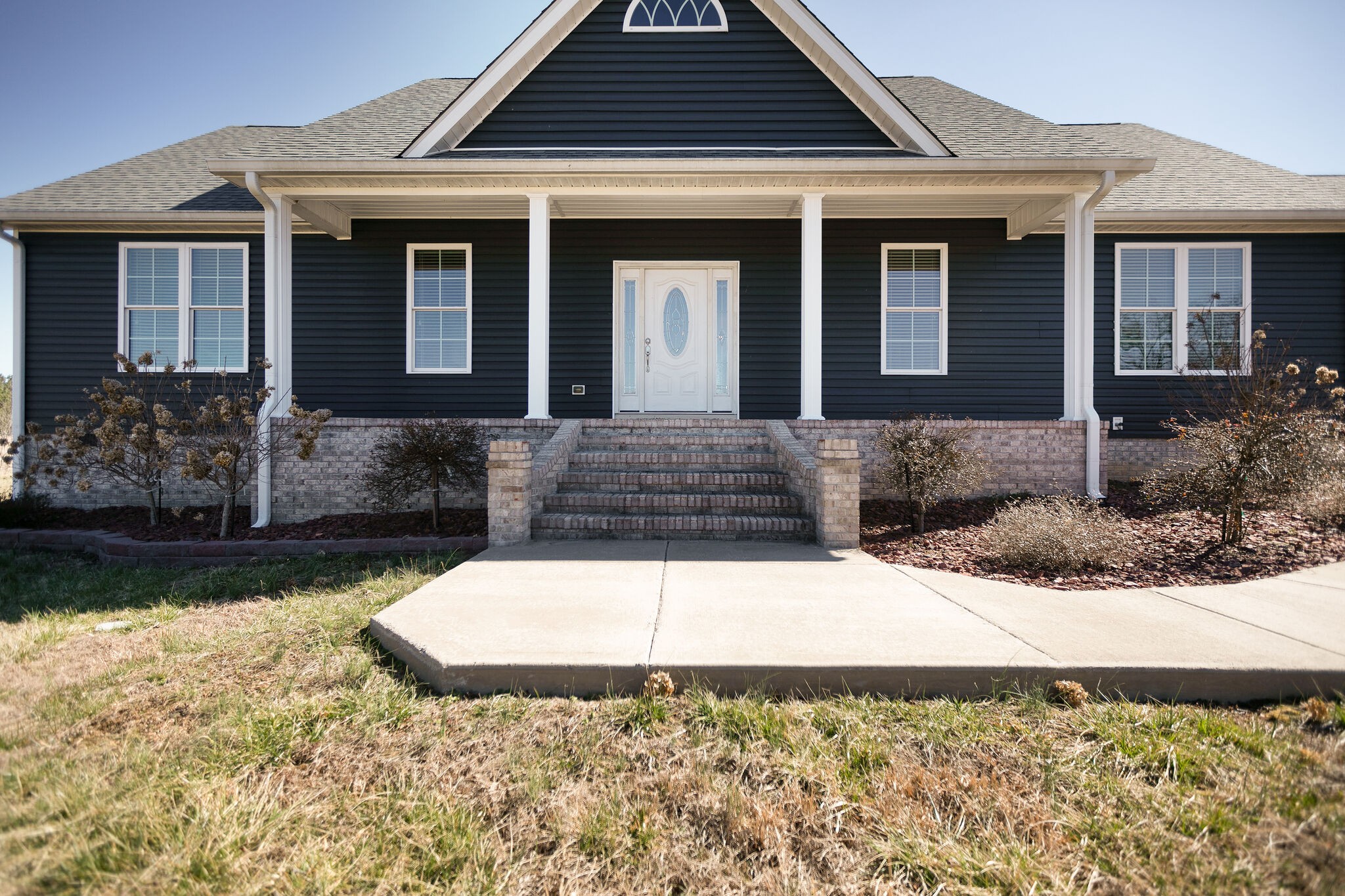 58 Locker Road Summertown, TN 38483 - Photo 2 of 28 a front view of a house with a yard