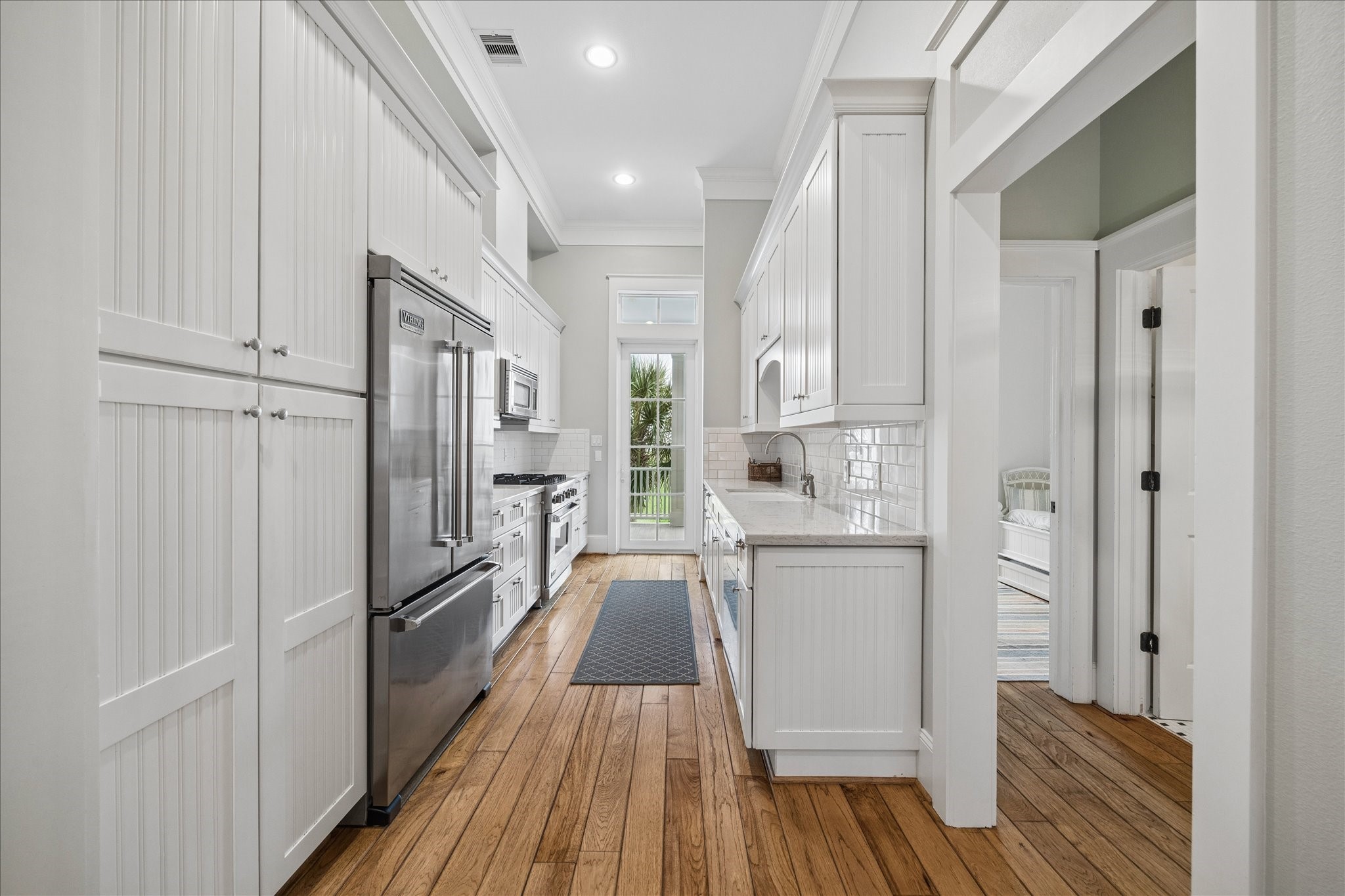 710 Positano Road Galveston, TX 77550 - Photo 12 of 36 The kitchen is equipped with luxury viking appliances.