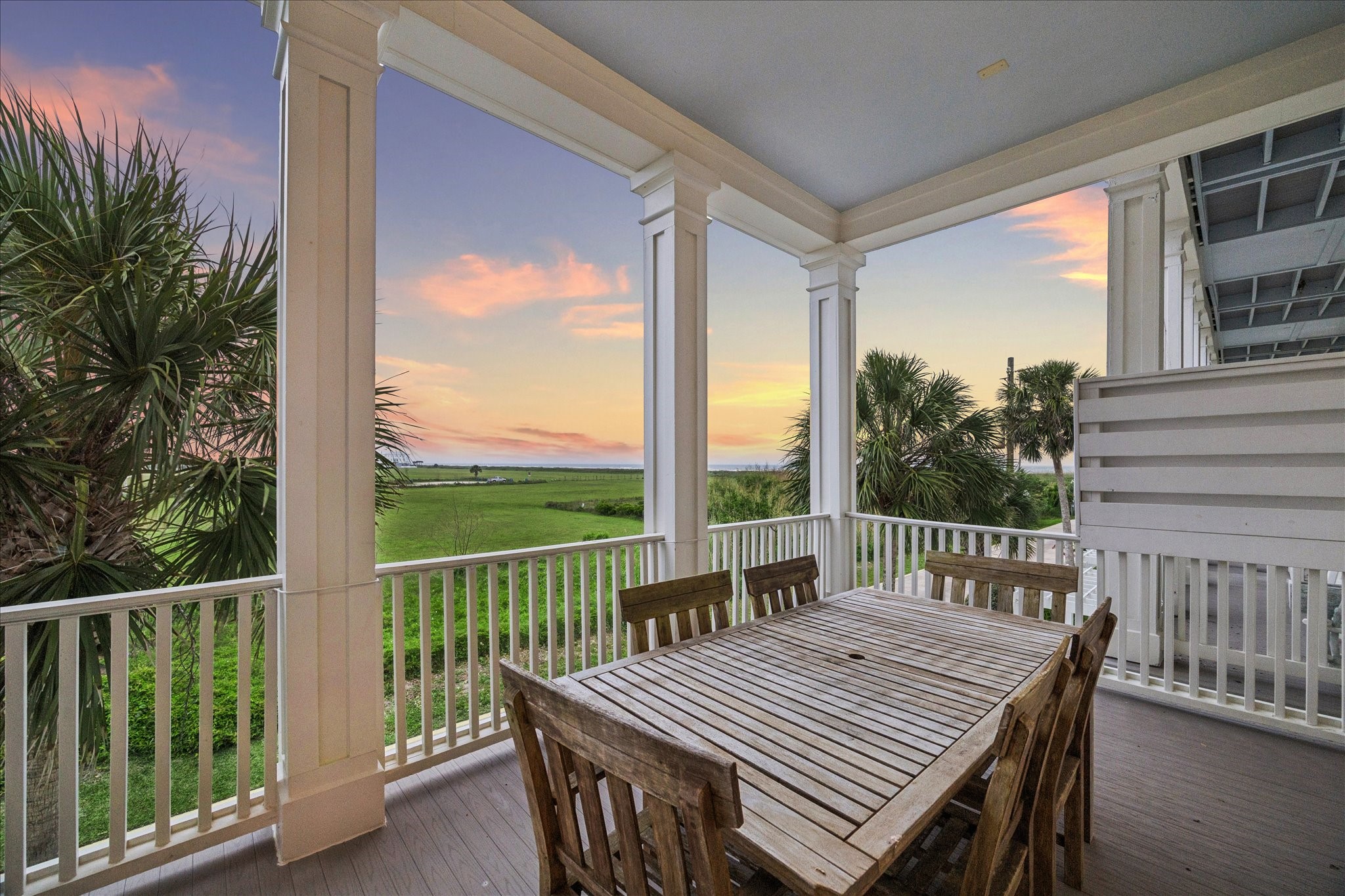 710 Positano Road Galveston, TX 77550 - Photo 14 of 36 Enjoy al fresco dining on the outdoor kitchen deck.