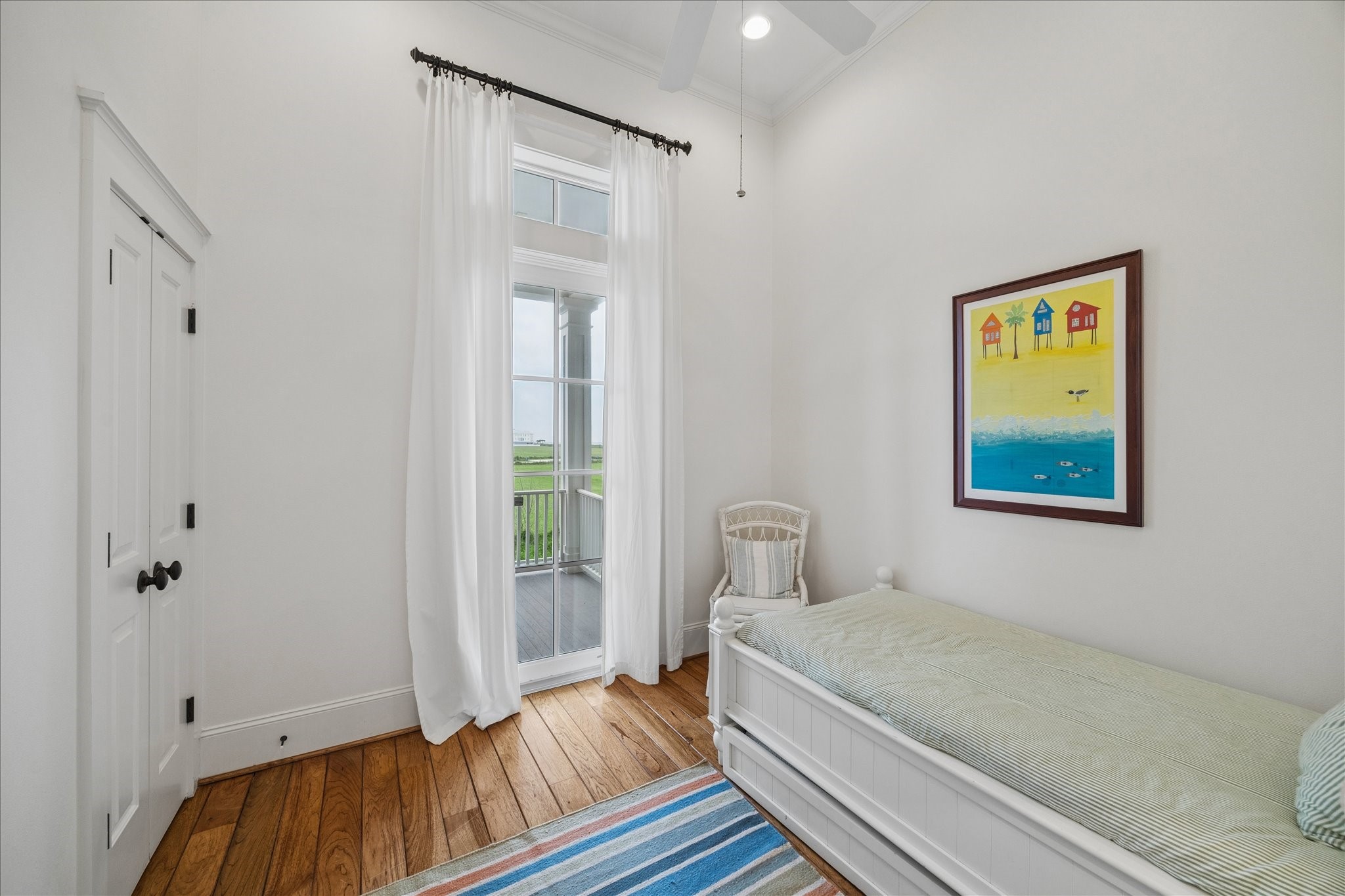 710 Positano Road Galveston, TX 77550 - Photo 15 of 36 The first floor bedroom is cozy and private.