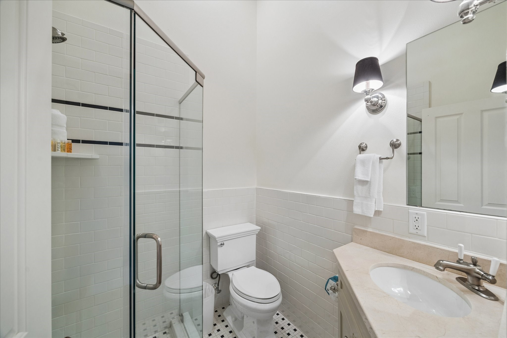 710 Positano Road Galveston, TX 77550 - Photo 16 of 36 The first floor bathroom has a walk in shower and is located next to the first floor bedroom.