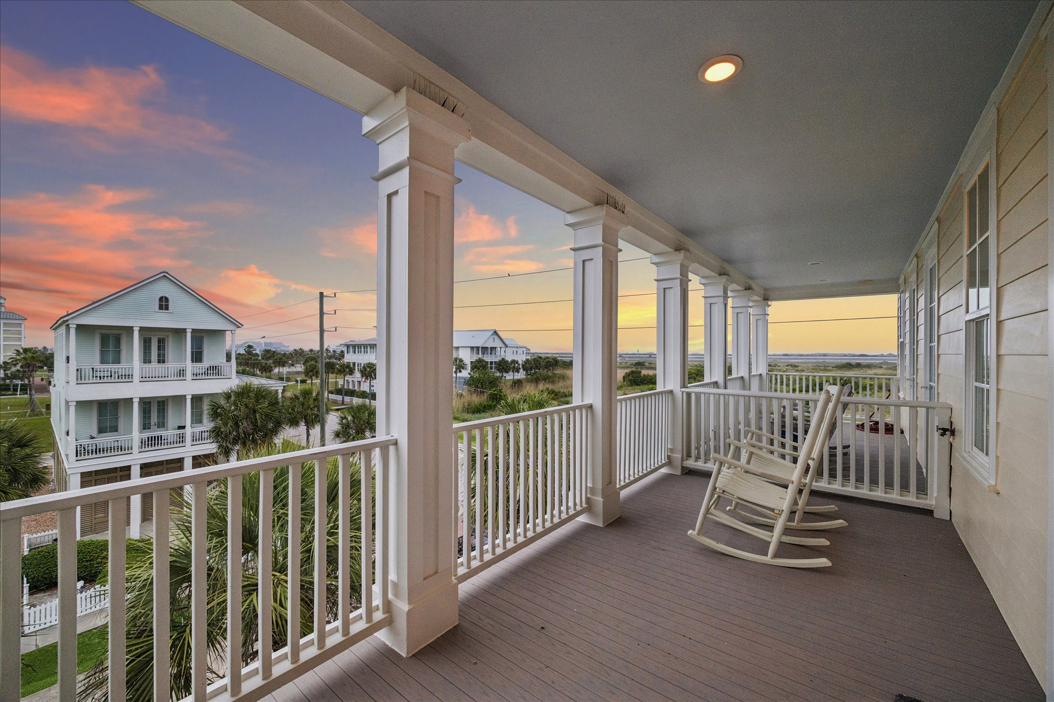 710 Positano Road Galveston, TX 77550 - Photo 21 of 36 Private deck located off bedroom three has gorgeous west facing views.